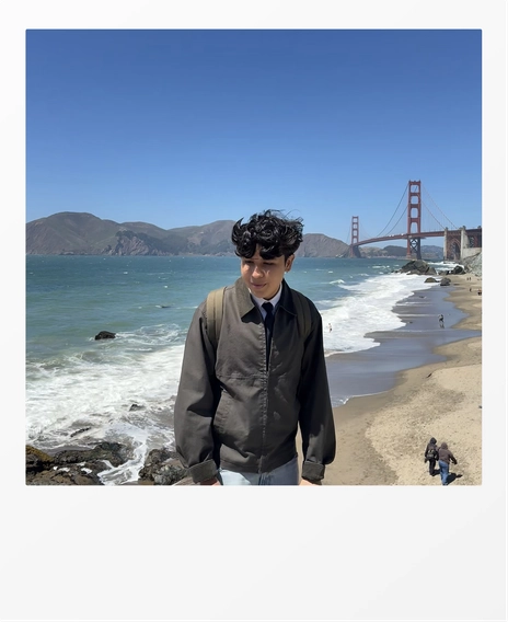A polaroid of me in front of Jan Rebolledo the Golden Gate Bridge.